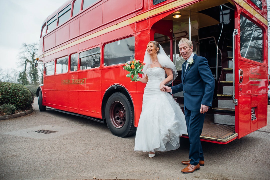 Bride steps of the bus at Tithe Barn, Bedford.