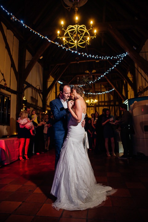 bride and groom have their first dance at The Barns Hotel Bedford.