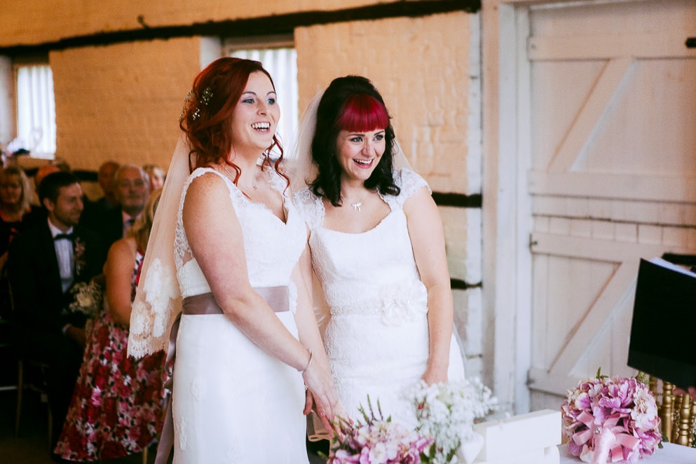 Brides Laughing at LGBTQ+ Wedding