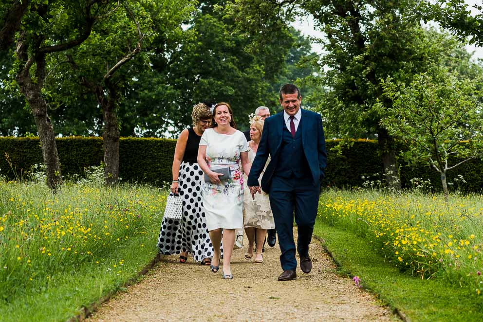 Guests approaching ceremony building at Sulgrave Manor