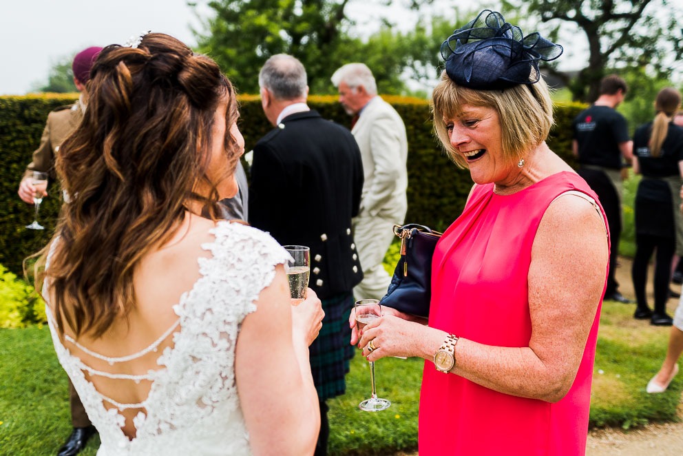 Wedding Guest Smiling at Bride at Sulgrave Manor