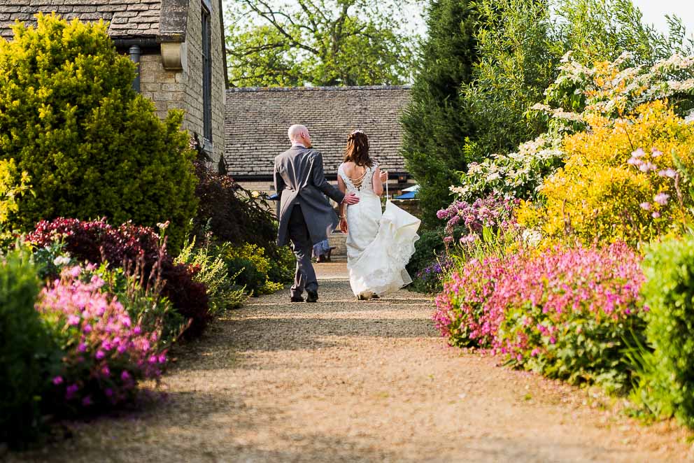 Bride and Groom Walking Away at Sulgrave Manor